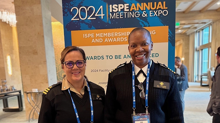 Commander June Page and Captain Jill Hammond pause for a photo at the 2024 ISPE Annual Meeting & Expo following their participation in ISPE’s Women in Pharma® workshop, “Adaptable Leadership.”