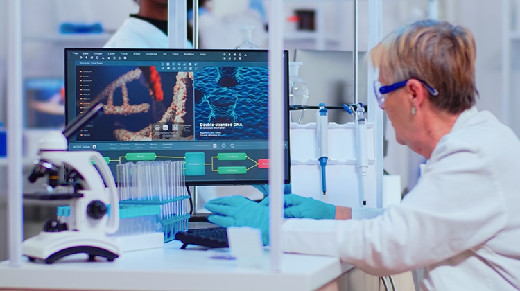 Biochemist-examining-vaccine-evolution-using-high-tech-researching-diagnosis