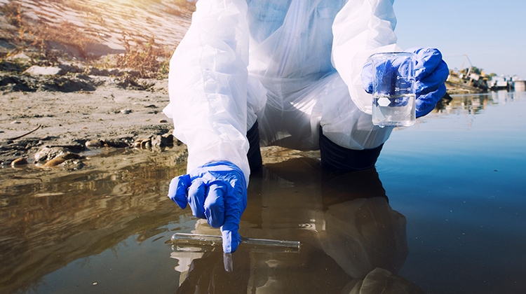 ecologist-taking-samples-water-with-test-tube-from-city-river-determine-level-contamination-pollution