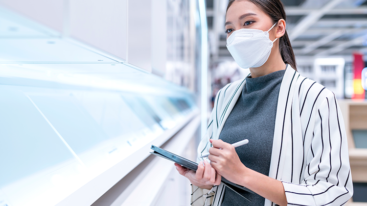 woman-wear-mask-use-tablet-checking-amount-stock-product-inventory-shelf-distribution-business-shipping-delivery-service-Component-to-Patient-750px.png