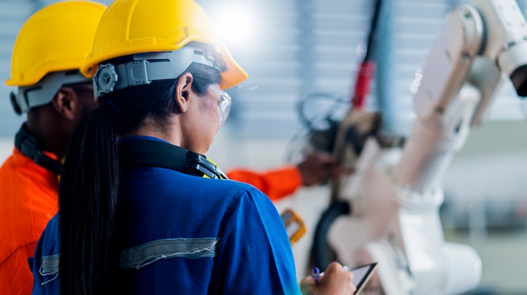 engineer-cooperation-male-female-technician-maintenance-control-relay-robot-arm-system-with-tablet-laptop-control-quality-operate-process-industry-40-manufacturing-factory-750px.jpg