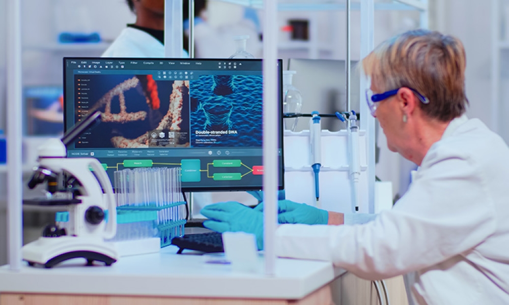 Biochemist-examining-vaccine-evolution-using-high-tech-researching-diagnosis