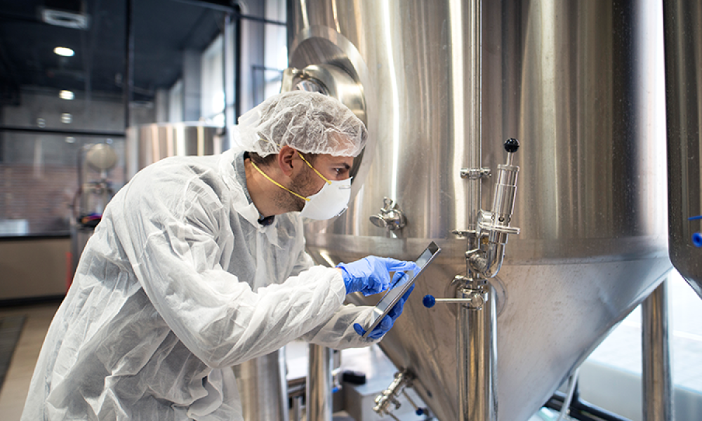 Professional Technologist Checking Production Factory