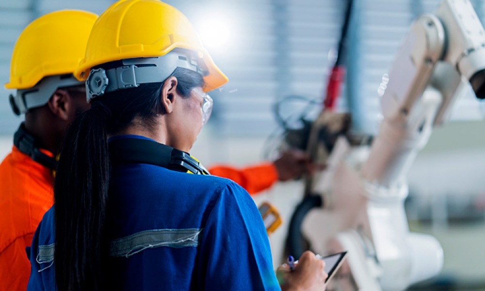 engineer-cooperation-male-female-technician-maintenance-control-relay-robot-arm-system-with-tablet-laptop-control-quality-operate-process-industry-40-manufacturing-factory-750px.jpg