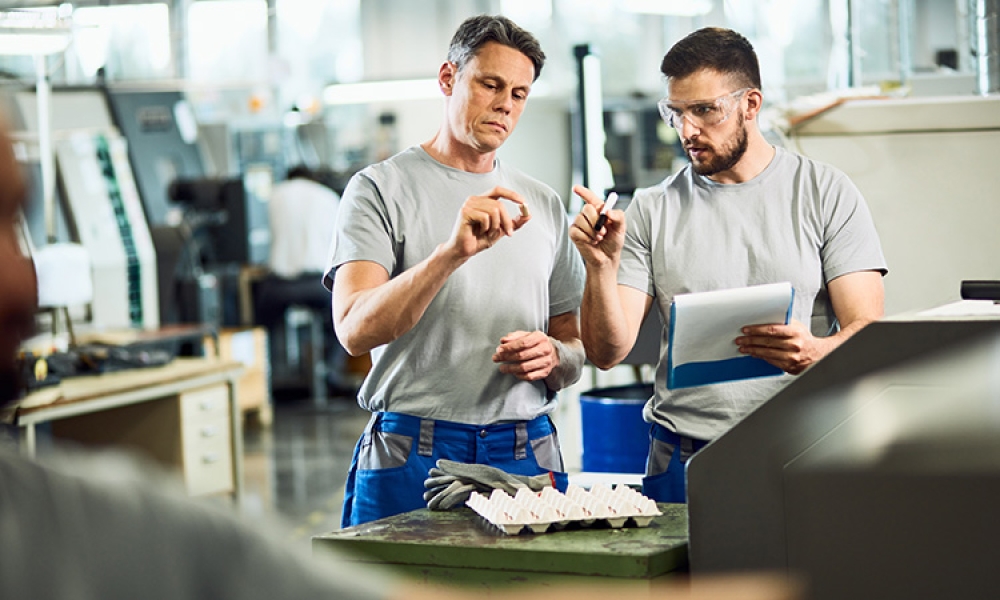 industrial-workers-quality-control-manufactured-products-factory-750px.jpg